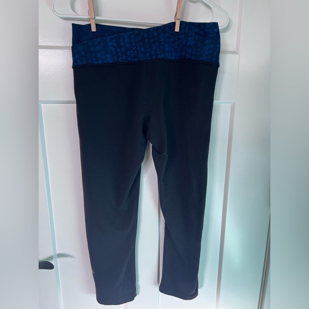 Lululemon crop leggings, black with blue patterned cross waist